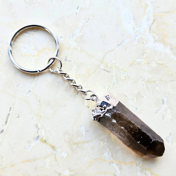 Smoky quartz tip silver colored key ring