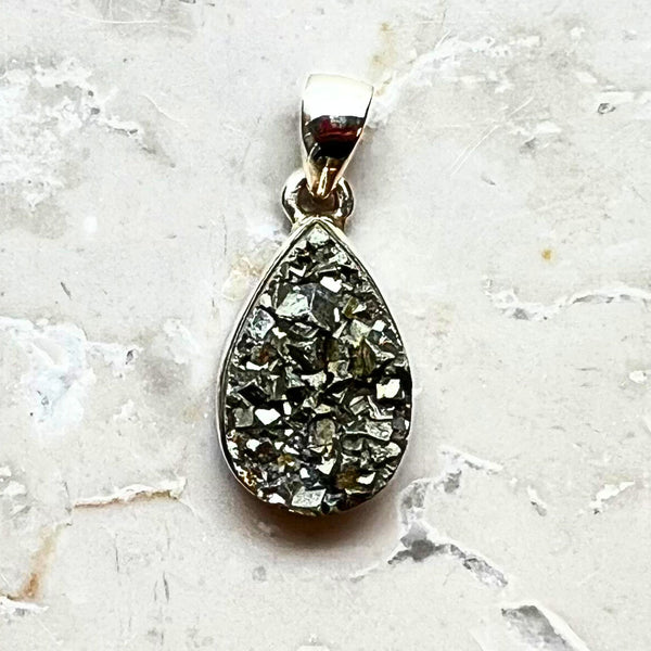 Pyrite cluster in silver pendant