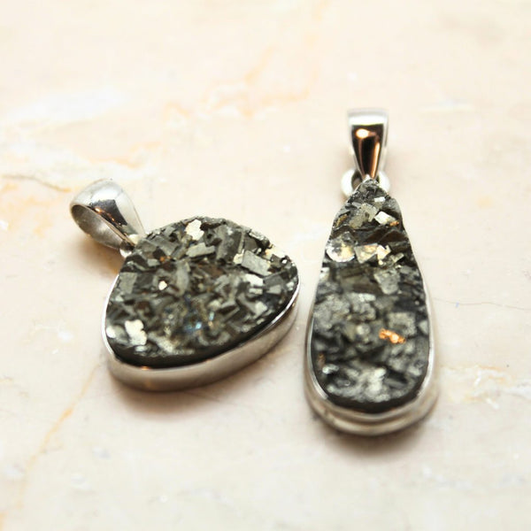 Pyrite cluster in silver pendant