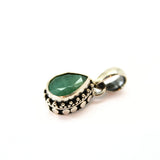 Emerald, drop-shaped pendant with silver filigree