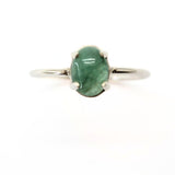 Emerald, claw-set oval emerald in silver setting