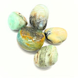 Opal, pink tumbled stone