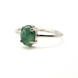 Emerald, claw-set oval emerald in silver setting
