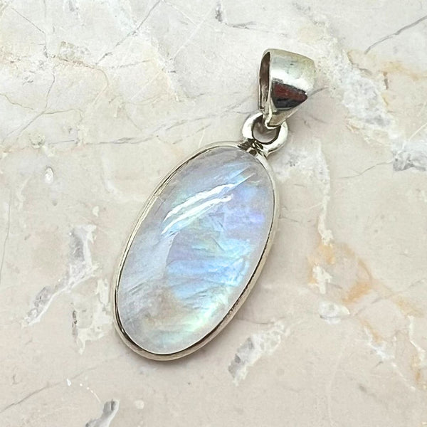 Rainbow moonstone, small oval pendant in plain silver