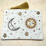 Vaaleanpunainen samettinen kangaskassi, jossa on elämän puu