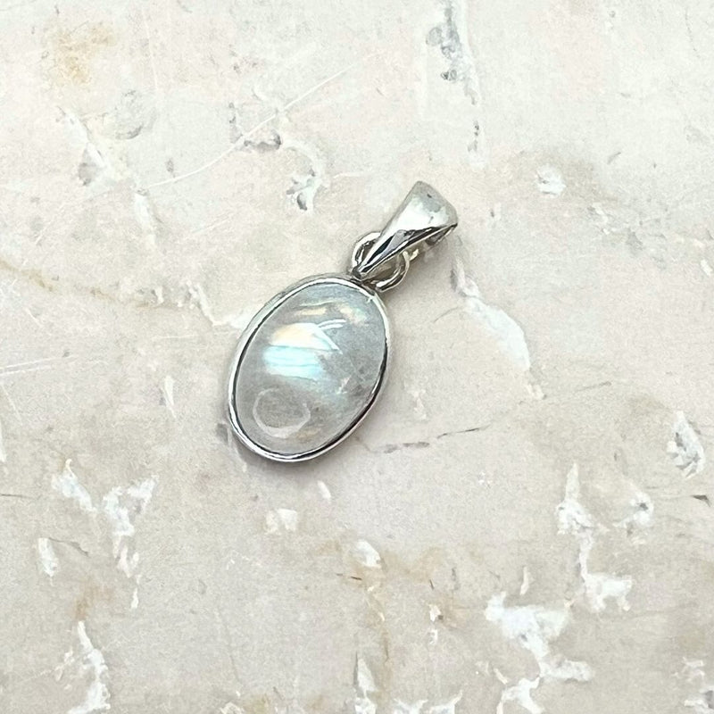 Rainbow moonstone, small oval pendant in plain silver