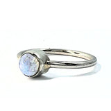 Rainbow pattern stone in simple silver ring