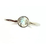 Rainbow pattern stone in simple silver ring