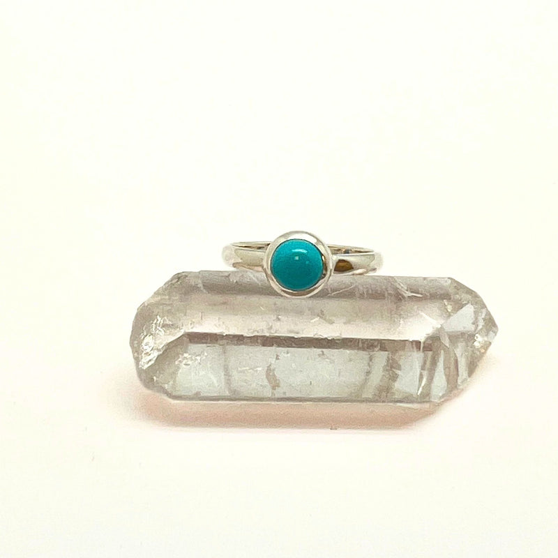 Turquoise round stone in sterling silver