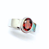 Garnet, oval lying stone in silver ring