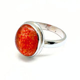 Solsten oval glittrande sten i silverring