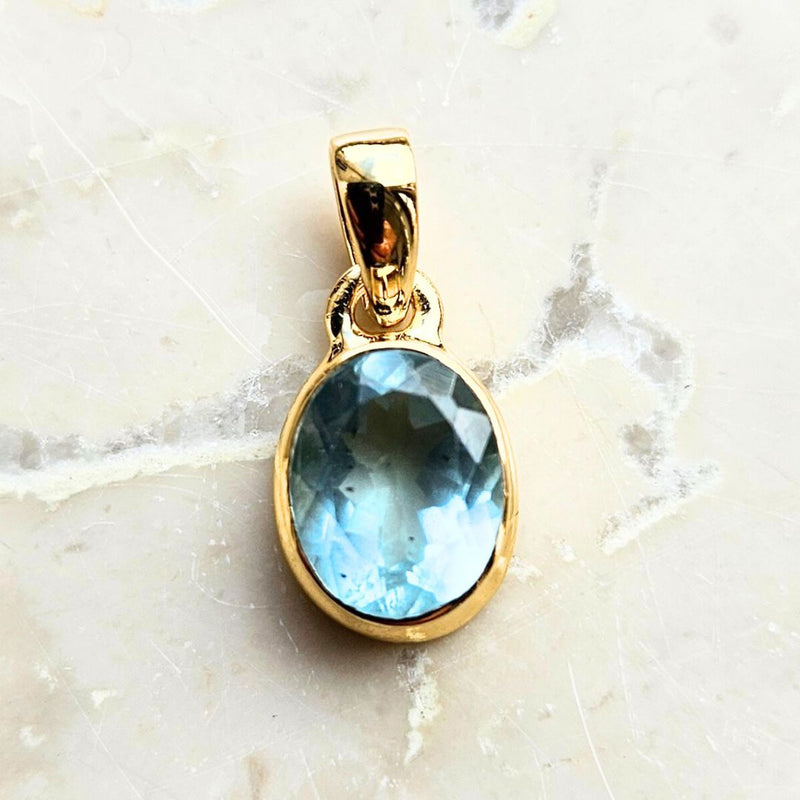 Aquamarine faceted oval gold-plated silver pendant