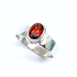 Garnet, oval lying stone in silver ring