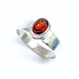 Garnet, oval lying stone in silver ring