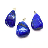 Lapis Lazuli, litet trumlat hänge med silverfäste