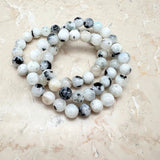 Regnbågsmånsten svart och blått glitter armband 8 mm