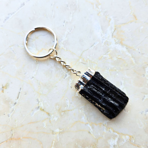 Tourmaline tip silver colored key ring