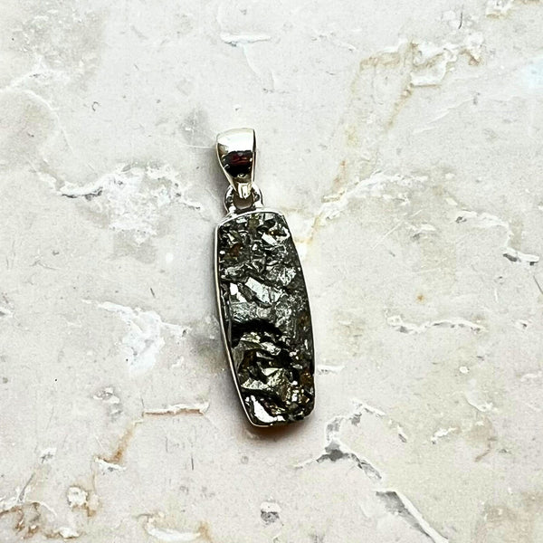 Pyrite cluster in silver pendant