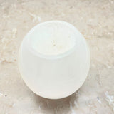 Ljuslykta, rund äggformad vit selenit