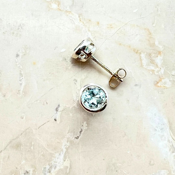 Blue topaz, stud earrings in smooth silver setting