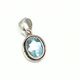 Sininen topaasi soikea mustalla reunuksella