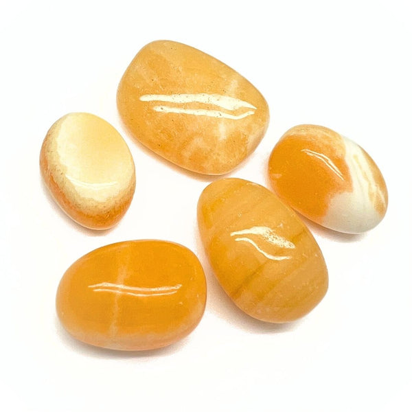Calcite orange, tumbled A quality