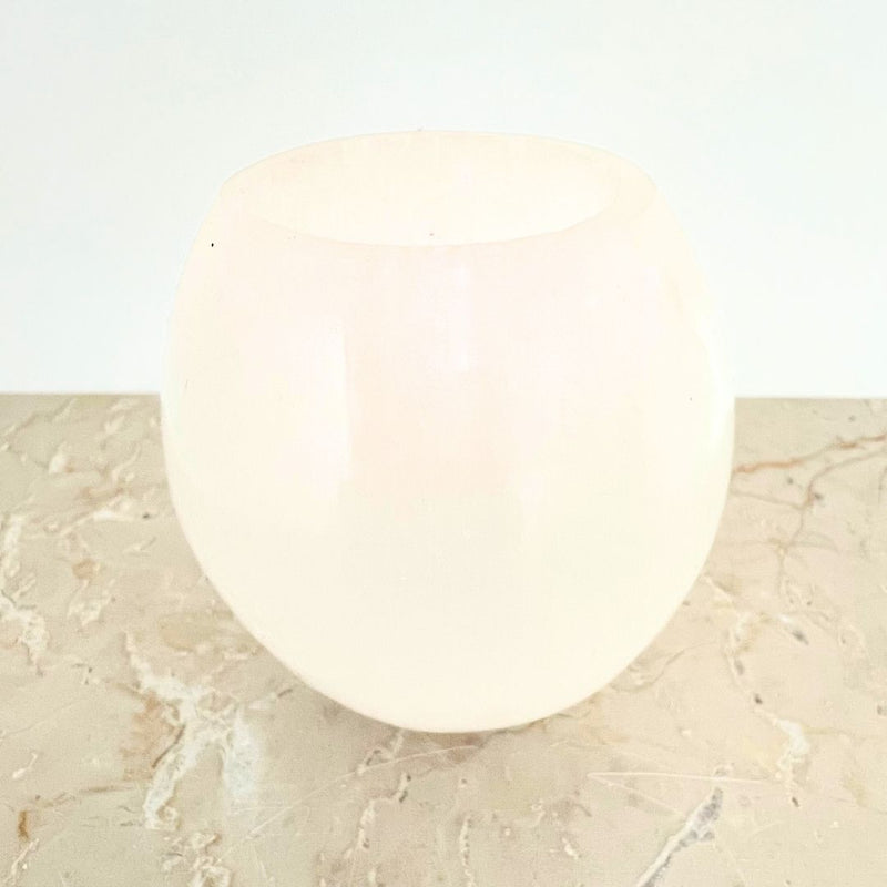 Ljuslykta, rund äggformad vit selenit