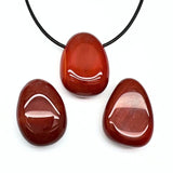 Karneol, trumlat hänge med hål