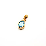 Blå topas, månadssten för december i guldpläterat silverhänge