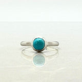 Turquoise round stone in sterling silver