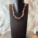 Auralite 23 -kaulakoru hopealukolla