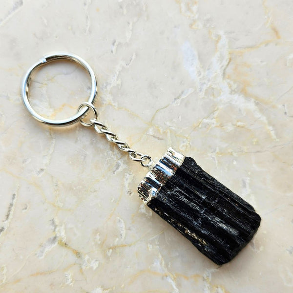 Tourmaline tip silver colored key ring