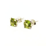 Peridot green sparkling faceted crystal stud in silver