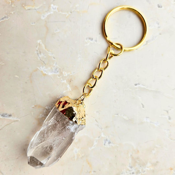 Rock crystal lace gold colored key ring