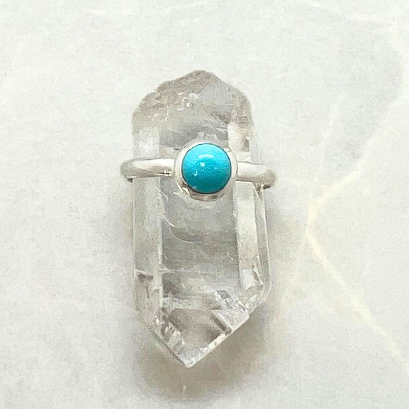 Turquoise round stone in sterling silver