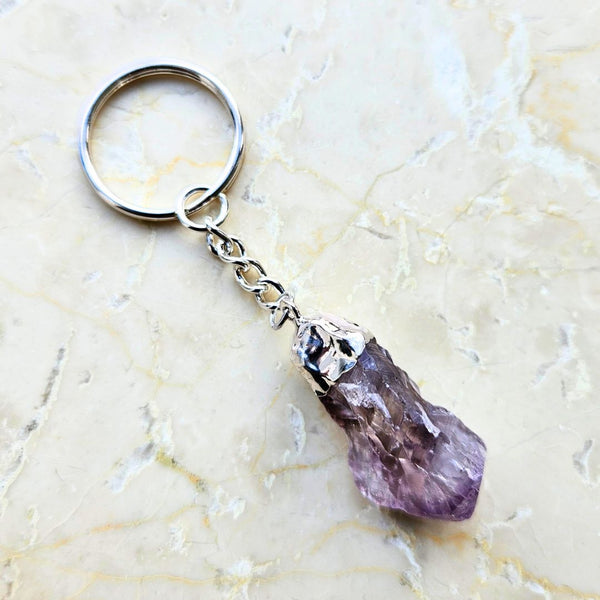 Amethyst tip silver colored key ring