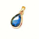Labradorite, drop as a unique faceted pendant in gold