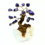 Bonsai tree with purple quartz on a rock crystal base