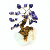 Bonsai tree with purple quartz on a rock crystal base