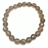 Smoky quartz in AA quality, bracelet with faceted 8 mm crystals
