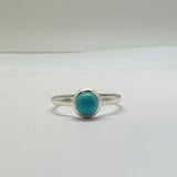 Turquoise round stone in sterling silver