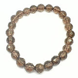 Smoky quartz in AA quality, bracelet with faceted 8 mm crystals