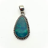 Opal large pendant with irregular filigree