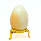 Orange calcite, stone egg
