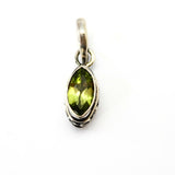 Peridot, pendant in ellipse silver filigree