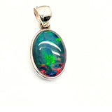 Opal, ovalt silverhänge med liten silverkant