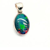 Opal, ovalt silverhänge med liten silverkant