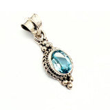 Blå topas, ovalt hänge med fassetslipad sten