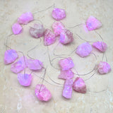 Rosenkvarts - förtrollande kristalljus, slinga med LED