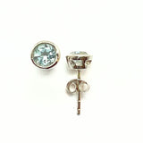 Blue topaz, stud earrings in smooth silver setting